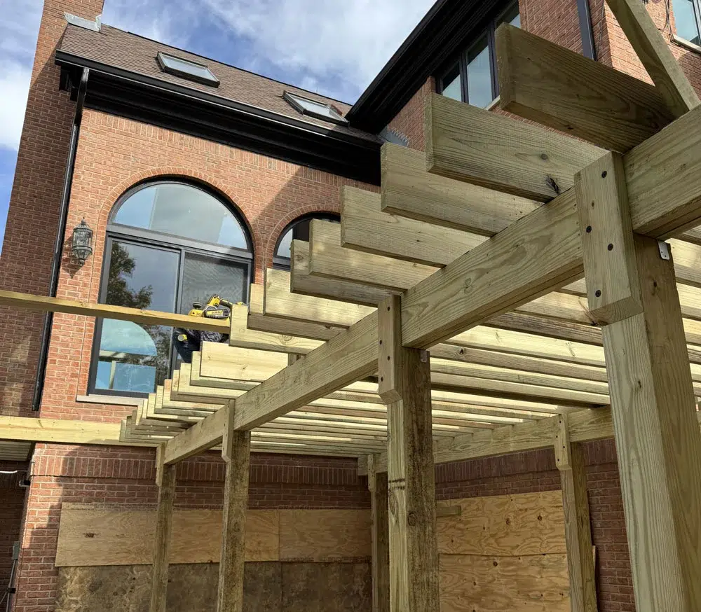 Under-Deck View Of Royal Deck Installation Showing Correct Joist Spacing, Beam Support, And Structural Integrity