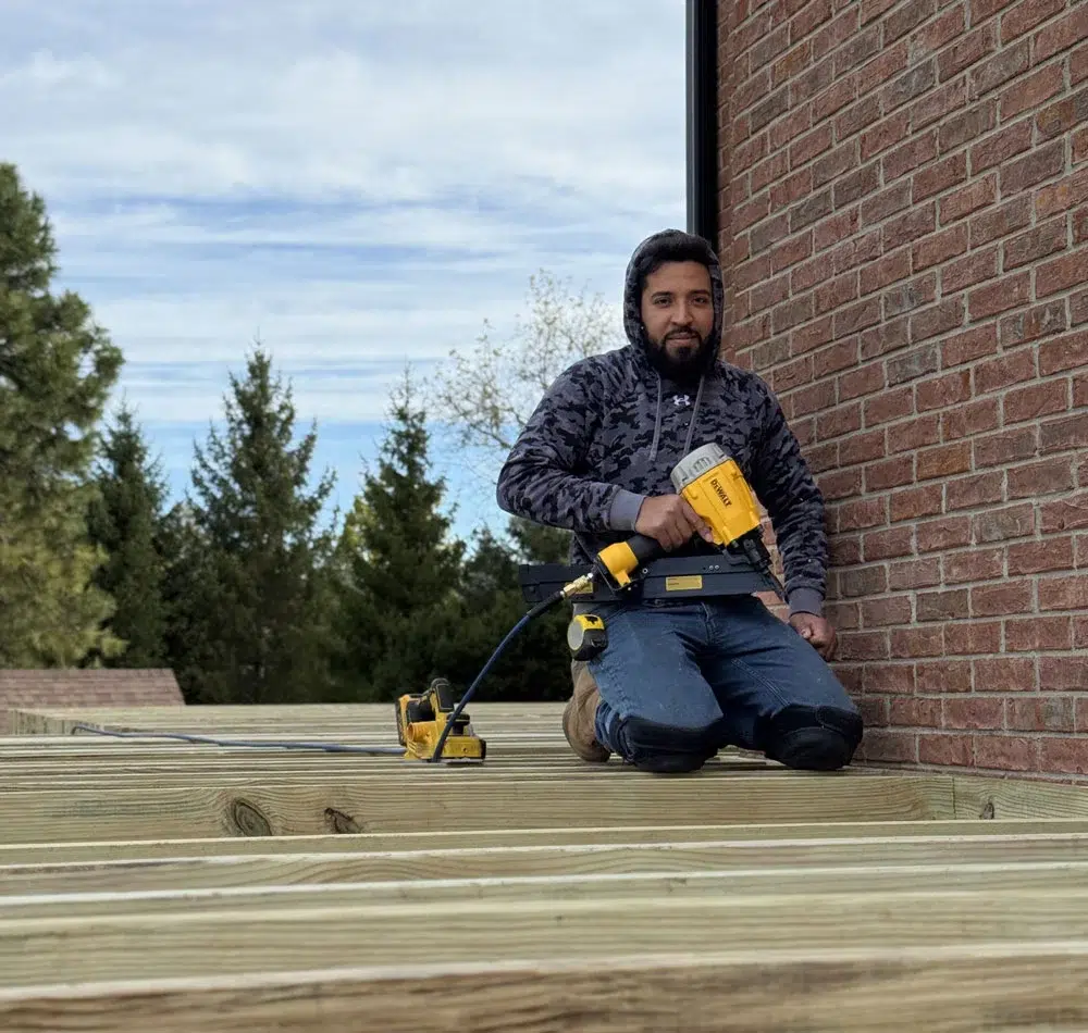 Royal Deck Team Member Performing Quality Deck Installation Work