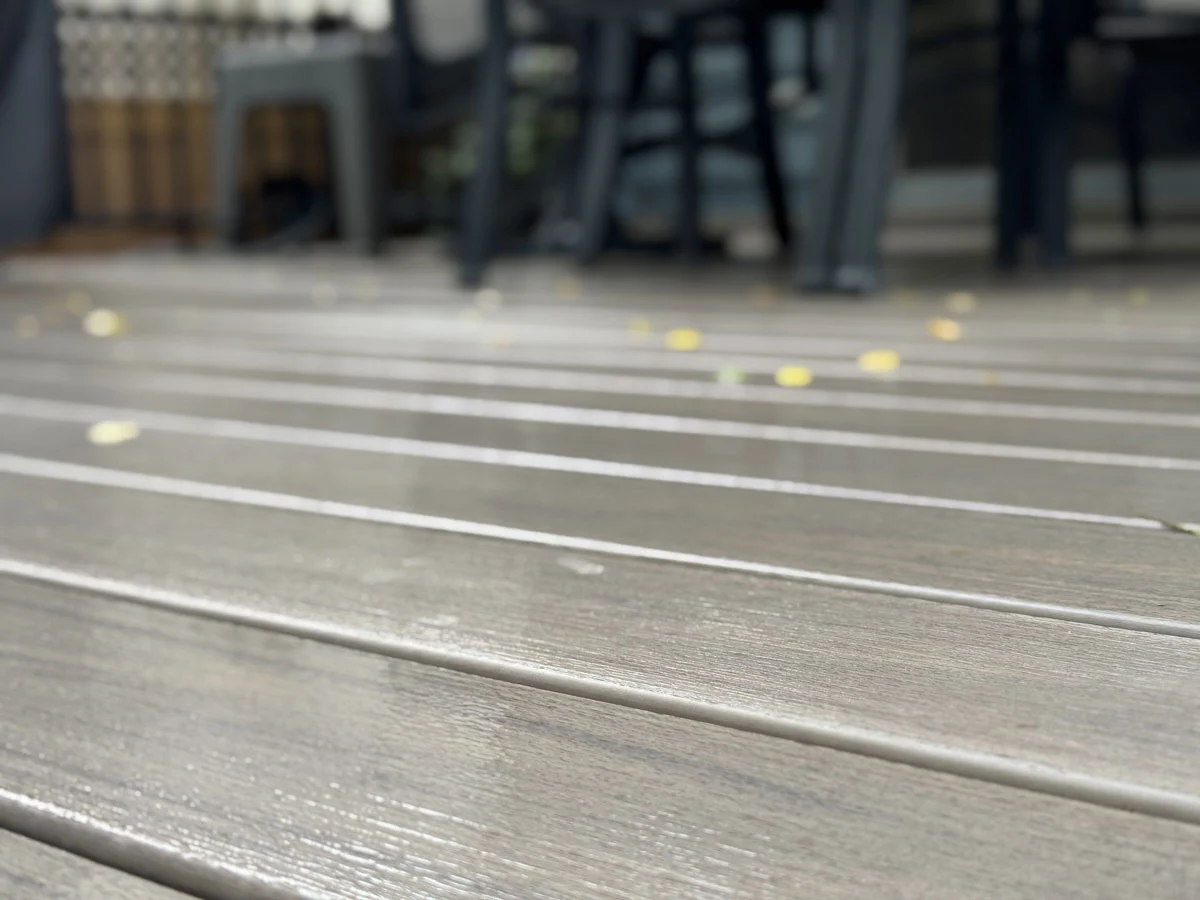 Close-Up Of Composite Deck Boards With Realistic Wood-Grain Texture And A Smooth, Low-Maintenance Surface